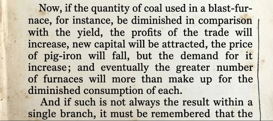 A scanned page from W. Stanley Jevons’ 1865 book The Coal Question, showing text arguing that improved coal efficiency in blast furnaces leads to lower iron prices, increased demand, and ultimately more furnaces and greater total coal consumption.