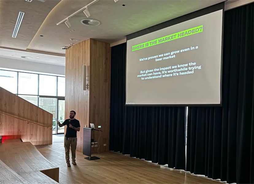 Labrys CEO Lachlan Feeney presenting a slide titled Where is the market headed during the 6th anniversary talk